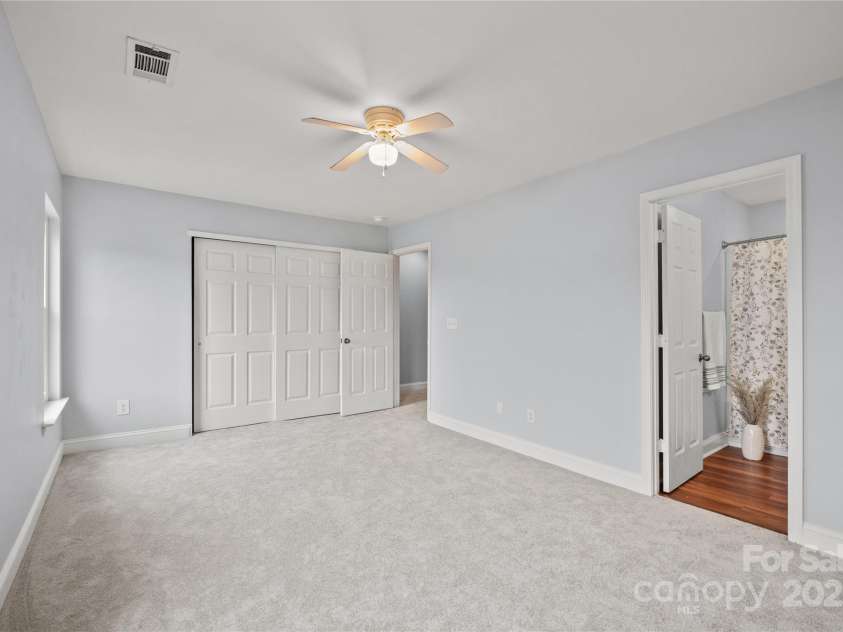 233 Waterlynn Road, Mooresville, NC 28117.  MLS# CAR4251215, YatesRealty ID 20801. Secondary bedroom with full bath on suite