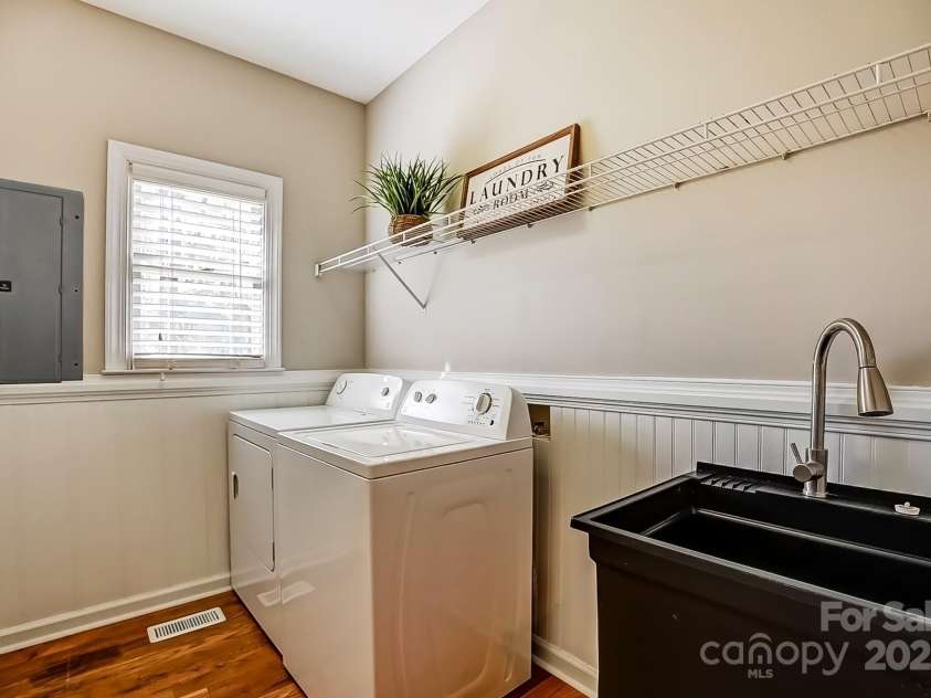 7306 Timbercreek Court, Denver, NC 28037.  MLS# CAR4231186, YatesRealty ID 20806. Bright laundry room with plenty of natural light and a convenient utility sink.Bright laundry room with plenty of natural light and a convenient utility sink.Bright laundry room with plenty of natural light and a conve