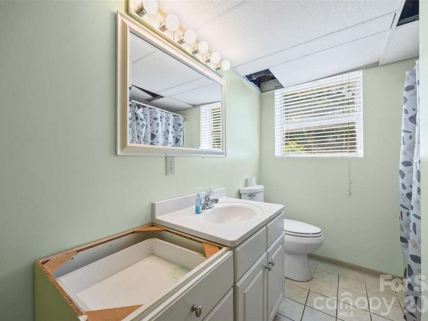 7233 Tuckaseegee Road, Charlotte, NC 28214.  MLS# CAR4379015, YatesRealty ID 20810. Basement bath