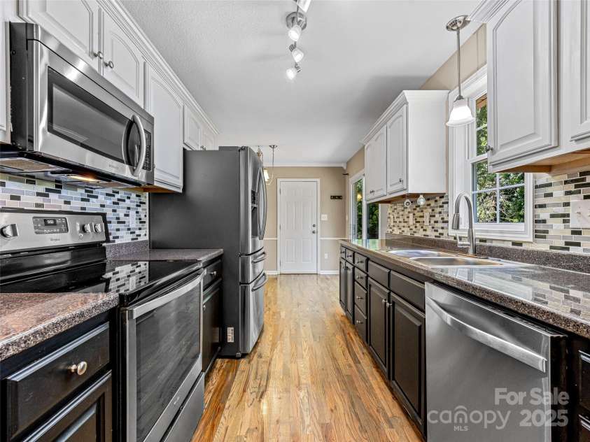 24 Memory Lane, Arden, NC 28704.  MLS# CAR4271888, YatesRealty ID 20812. 