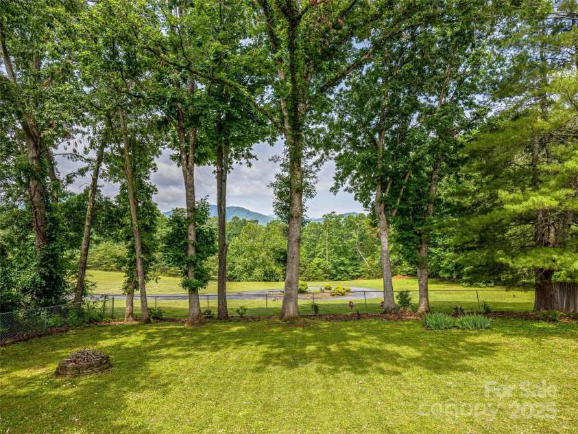 24 Memory Lane, Arden, NC 28704.  MLS# CAR4271888, YatesRealty ID 20812. 