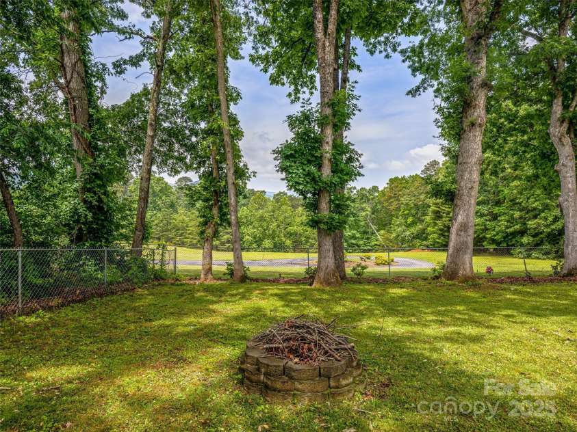24 Memory Lane, Arden, NC 28704.  MLS# CAR4271888, YatesRealty ID 20812. 