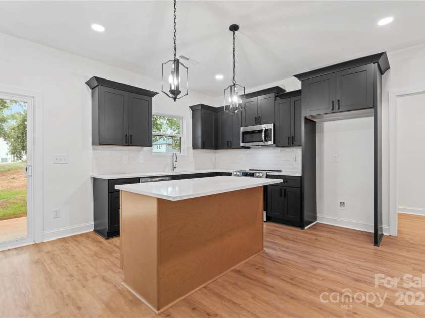 329 Henderson Circle, Harrisburg, NC 28075.  MLS# CAR4285649, YatesRealty ID 20814. 