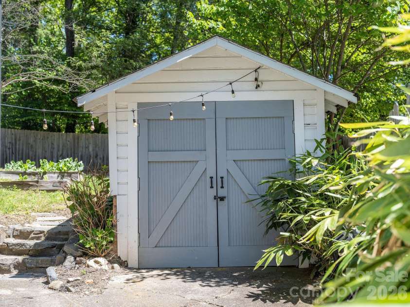 22 Westover Drive, Asheville, NC 28801.  MLS# CAR4376355, YatesRealty ID 20815. Picturesque Storage Garage