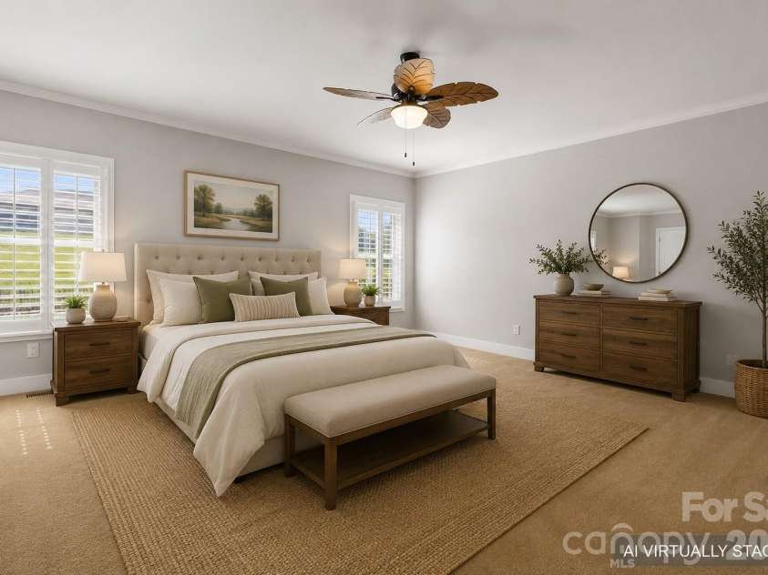 2411 Carriage Lane, Lincolnton, NC 28092.  MLS# CAR4369152, YatesRealty ID 20821. AI Staged Primary Bedroom