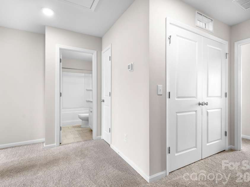 3939 Townes Boulevard, Terrell, NC 28682.  MLS# CAR4380268, YatesRealty ID 20824. Upstairs hallway with Laundry Area