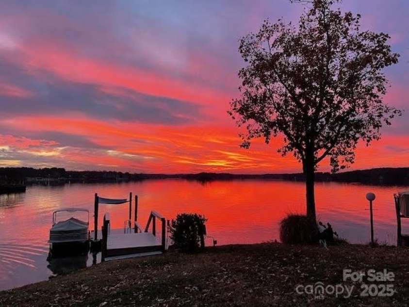 7010 Coventry Court, Tega Cay, SC 29708.  MLS# CAR4270562, YatesRealty ID 20824. Gorgeous sunset