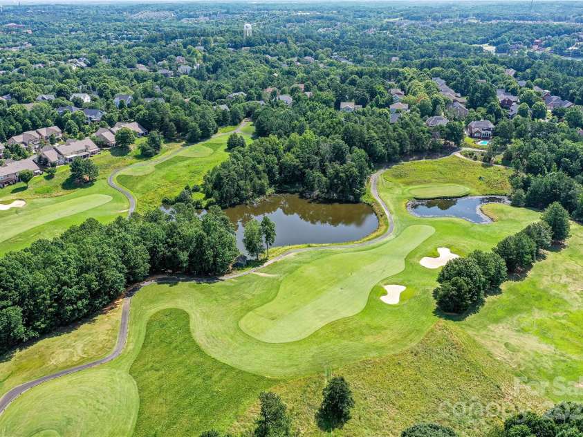 7010 Coventry Court, Tega Cay, SC 29708.  MLS# CAR4270562, YatesRealty ID 20824. Hole 10 and 18