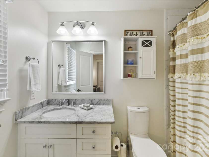 7010 Coventry Court, Tega Cay, SC 29708.  MLS# CAR4270562, YatesRealty ID 20824. Second Primary Bath