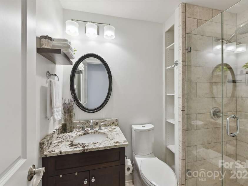 7010 Coventry Court, Tega Cay, SC 29708.  MLS# CAR4270562, YatesRealty ID 20824. Third full bath