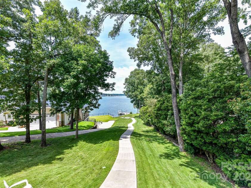 7010 Coventry Court, Tega Cay, SC 29708.  MLS# CAR4270562, YatesRealty ID 20824. Walking or Golf cart path