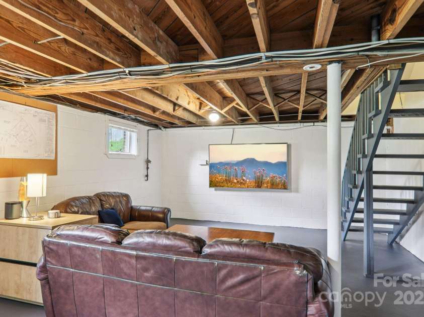 318 Old Leicester Highway, Asheville, NC 28806.  MLS# CAR4261061, YatesRealty ID 20828. Partially Finished Basement
