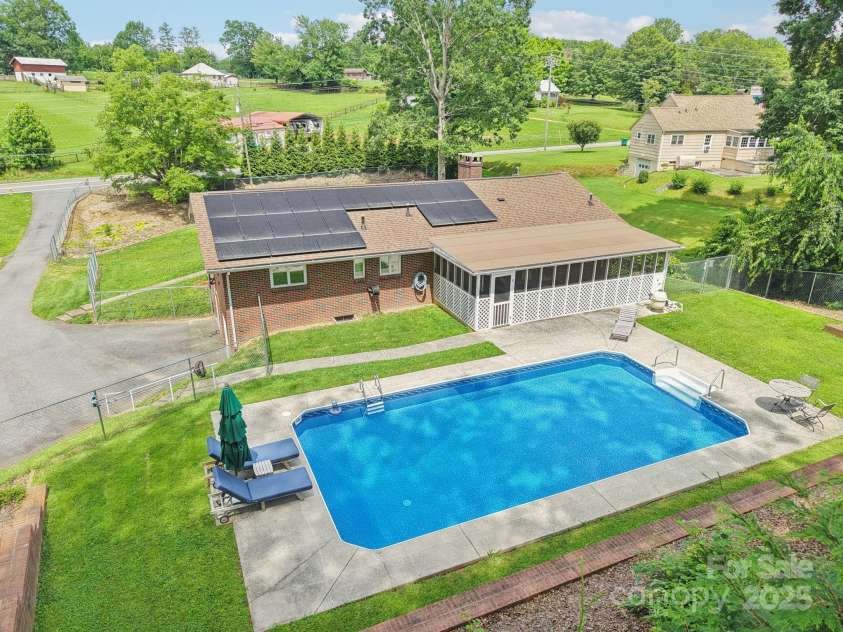318 Old Leicester Highway, Asheville, NC 28806.  MLS# CAR4261061, YatesRealty ID 20828. Pool and Solar