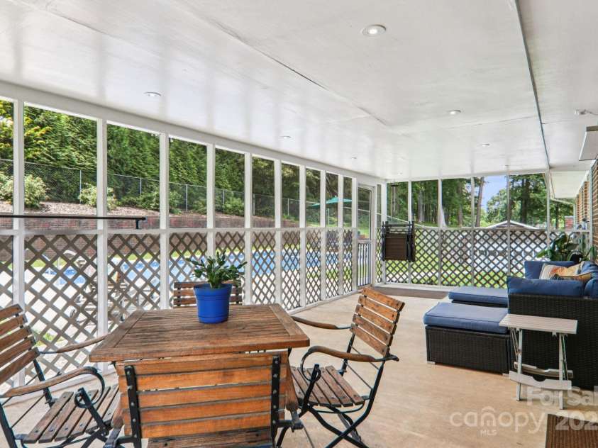 318 Old Leicester Highway, Asheville, NC 28806.  MLS# CAR4261061, YatesRealty ID 20828. Screened In Porch
