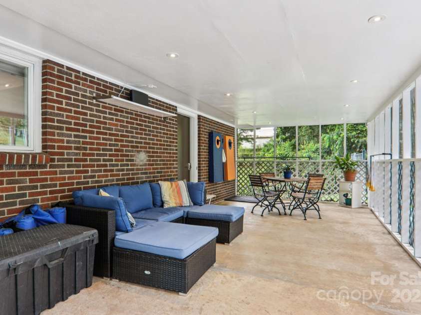 318 Old Leicester Highway, Asheville, NC 28806.  MLS# CAR4261061, YatesRealty ID 20828. Screened Porch + Back of House