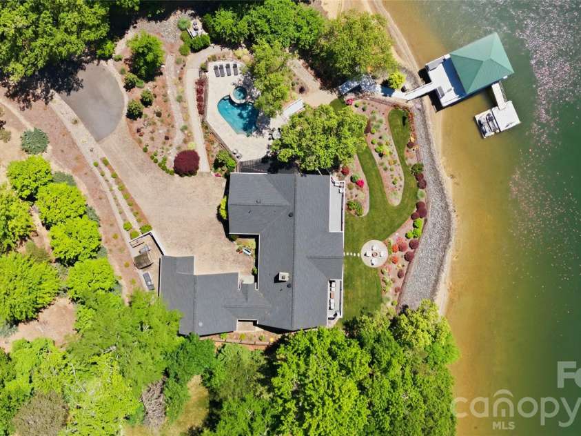 17812 Wilbanks Drive, Charlotte, NC 28278.  MLS# CAR4373319, YatesRealty ID 20830. A rare opportunity to own a custom waterfront retreat in a prime Charlotte-area location