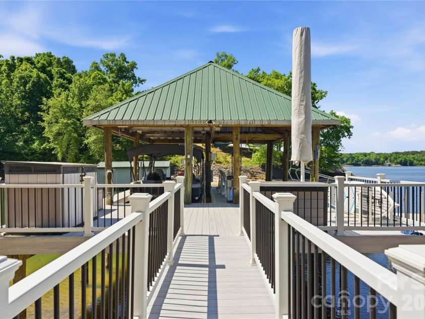 17812 Wilbanks Drive, Charlotte, NC 28278.  MLS# CAR4373319, YatesRealty ID 20830. Composite covered dock with boat lift and floating dock