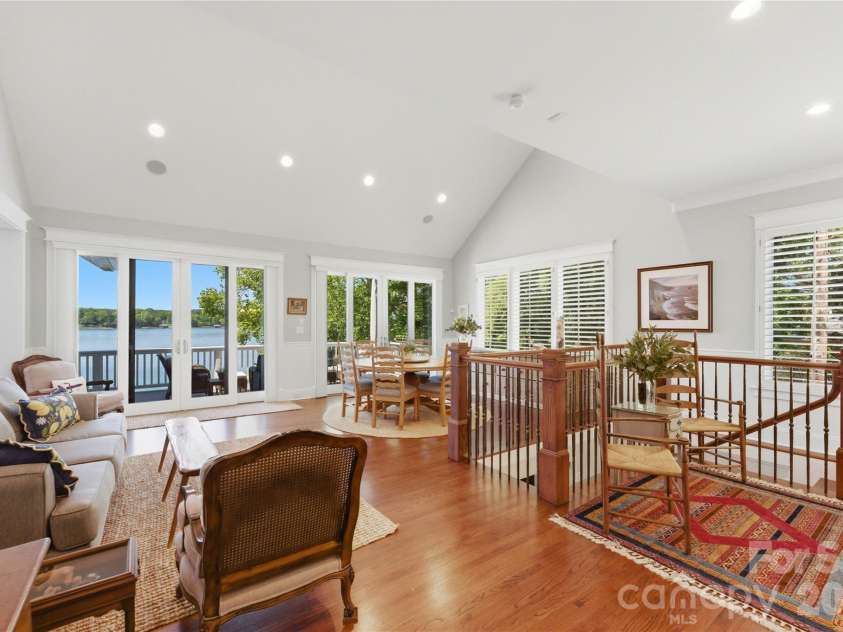 17812 Wilbanks Drive, Charlotte, NC 28278.  MLS# CAR4373319, YatesRealty ID 20830. The living and dining areas with a wet bar provide the perfect setting for both intimate dinners and larger gatherings