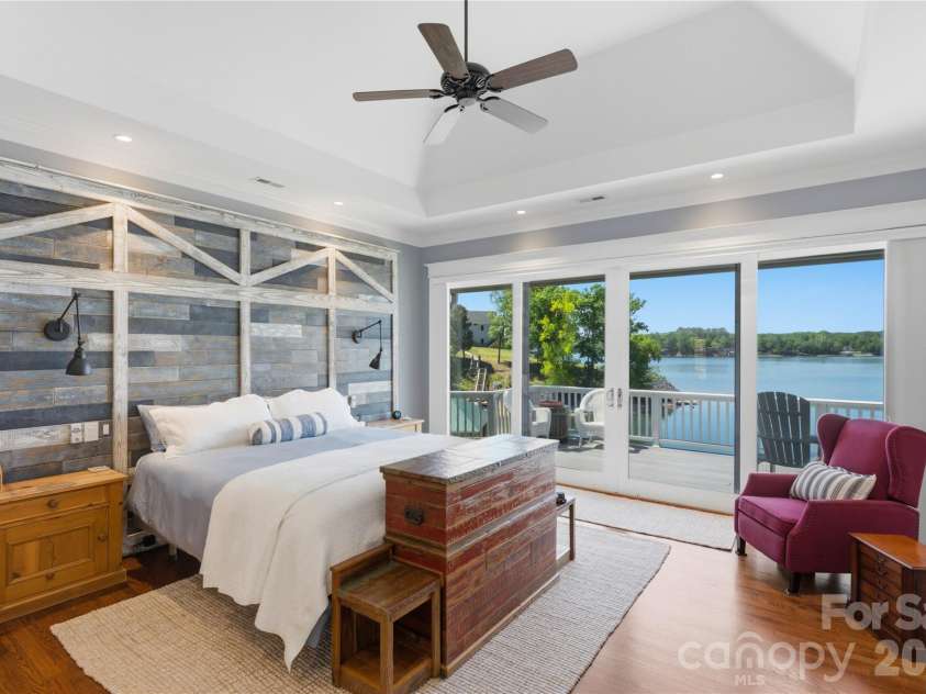17812 Wilbanks Drive, Charlotte, NC 28278.  MLS# CAR4373319, YatesRealty ID 20830. The luxurious primary suite is a true retreat, featuring dual walk-in closets, a spa-inspired bath with heated floors, and a private laundry area