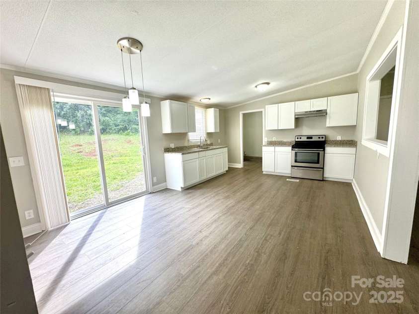 121 C & K Drive, Taylorsville, NC 28681.  MLS# CAR4270469, YatesRealty ID 20833. Dinning room 