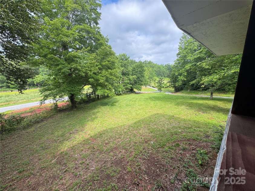 121 C & K Drive, Taylorsville, NC 28681.  MLS# CAR4270469, YatesRealty ID 20833. View from the front porch