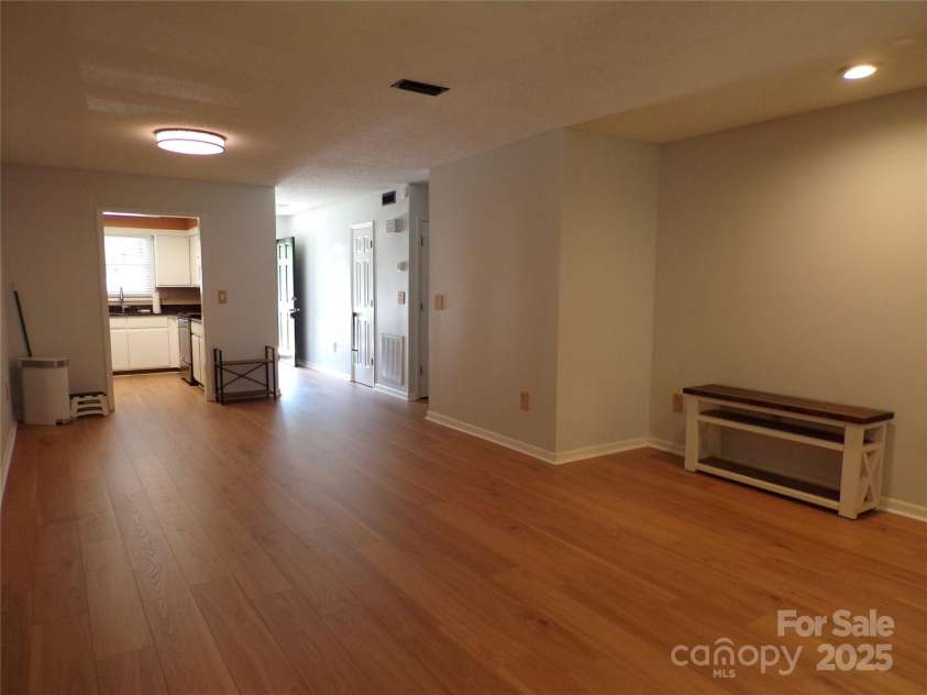 833 21st Avenue, Hickory, NC 28601.  MLS# CAR4270011, YatesRealty ID 20834. Living Room and Dining