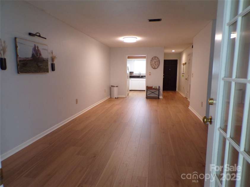 833 21st Avenue, Hickory, NC 28601.  MLS# CAR4270011, YatesRealty ID 20834. View From Sunroom into Living Room