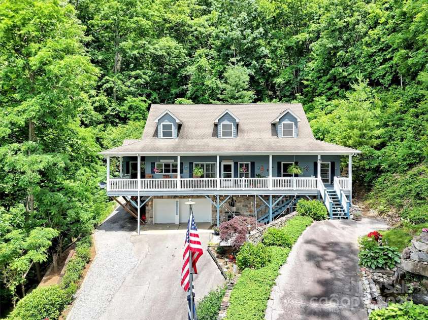 28 Mountain Breeze Drive, Maggie Valley, NC 28751.  MLS# CAR4271261, YatesRealty ID 20838. Beautiful Curb Appeal!