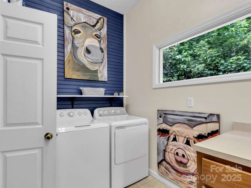 28 Mountain Breeze Drive, Maggie Valley, NC 28751.  MLS# CAR4271261, YatesRealty ID 20838. Laundry Off of Primary Suite