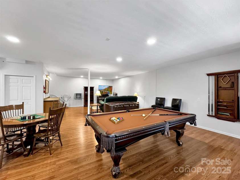 28 Mountain Breeze Drive, Maggie Valley, NC 28751.  MLS# CAR4271261, YatesRealty ID 20838. Lower Level Family Room/Game Room