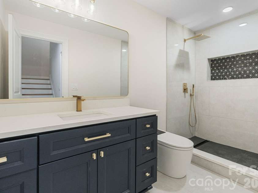 3204 Chancellor Lane, Monroe, NC 28110.  MLS# CAR4376911, YatesRealty ID 20840. Basement full bath