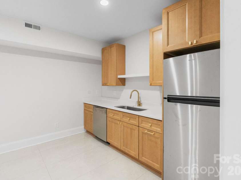 3204 Chancellor Lane, Monroe, NC 28110.  MLS# CAR4376911, YatesRealty ID 20840. Basement - wet bar