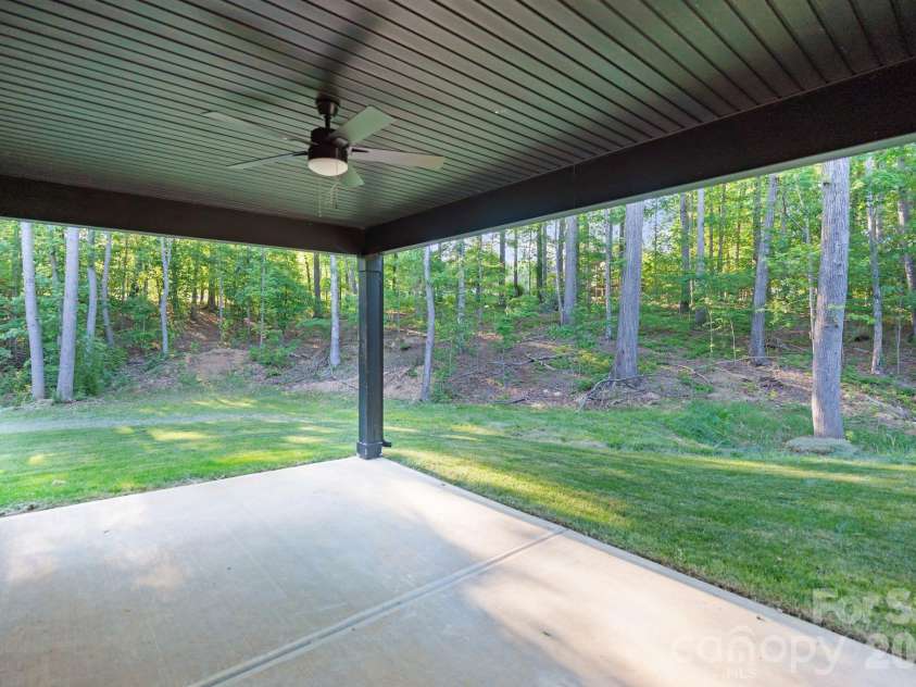 3204 Chancellor Lane, Monroe, NC 28110.  MLS# CAR4376911, YatesRealty ID 20840. Covered porch - lower level