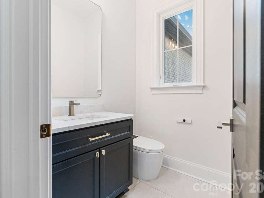 3204 Chancellor Lane, Monroe, NC 28110.  MLS# CAR4376911, YatesRealty ID 20840. Powder room