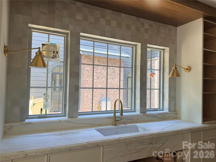 110 Hunter Lane, Charlotte, NC 28211.  MLS# CAR4306082, YatesRealty ID 20843. Kitchen- Beautiful tile work all around the window area