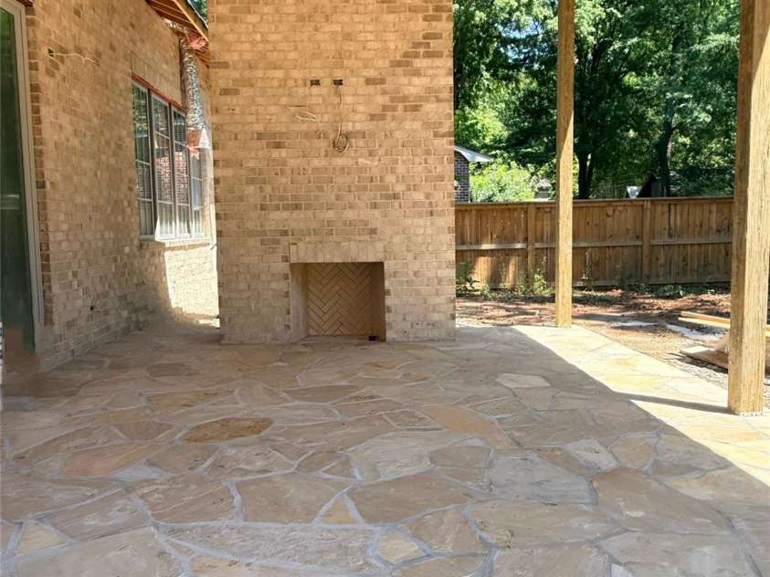 110 Hunter Lane, Charlotte, NC 28211.  MLS# CAR4306082, YatesRealty ID 20843. Wood Burning Brick Fireplace - New Flagstone Surface 5-8-26