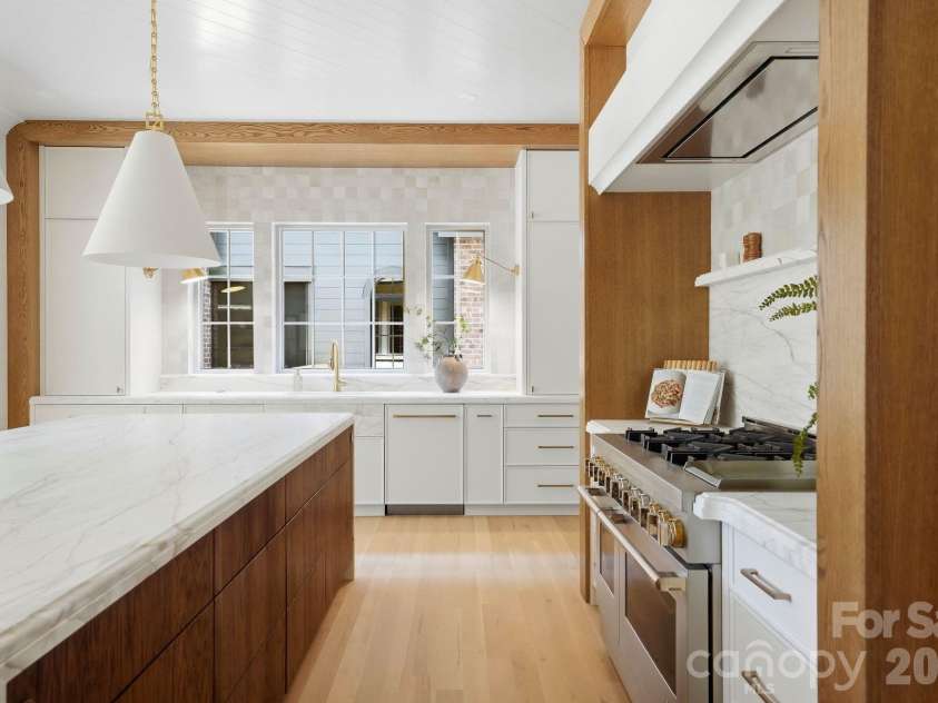 110 Hunter Lane, Charlotte, NC 28211.  MLS# CAR4424085, YatesRealty ID 20843. Hand crafted kitchen, marble counter tops