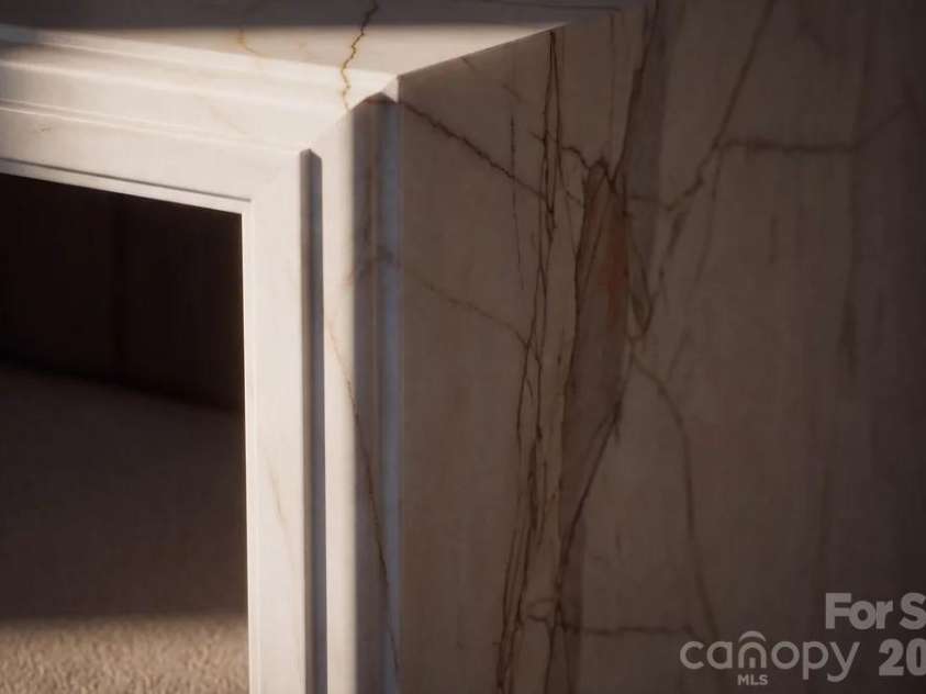110 Hunter Lane, Charlotte, NC 28211.  MLS# CAR4424085, YatesRealty ID 20843. Kitchen Island Detail -Mitered waterfall edging