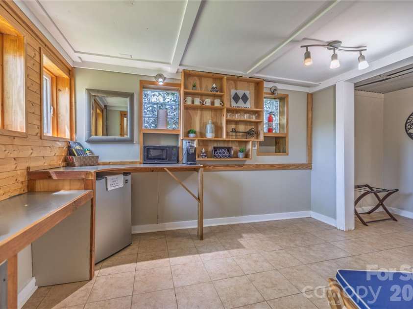 18 Hopedale Circle, Asheville, NC 28806.  MLS# CAR4372376, YatesRealty ID 20847. Basement flex space
