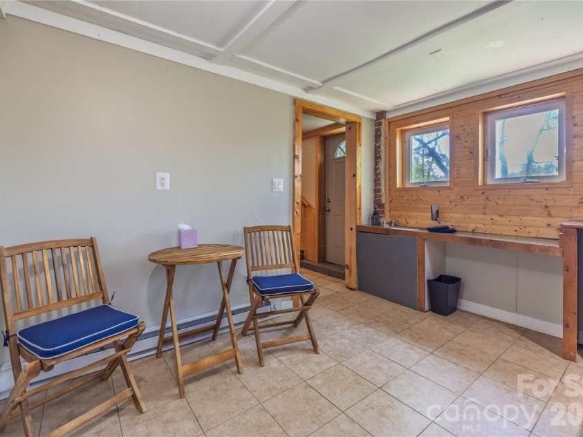 18 Hopedale Circle, Asheville, NC 28806.  MLS# CAR4372376, YatesRealty ID 20847. Flex space in basement with access to backyard