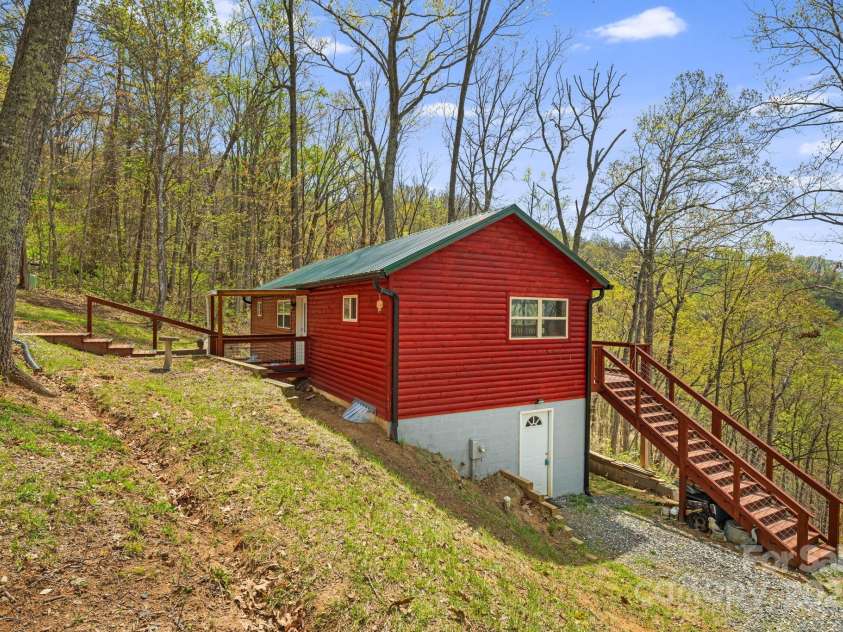 120 Wilderness Drive, Weaverville, NC 28787.  MLS# CAR4268806, YatesRealty ID 20849. Access to Lower Finished Shop Area