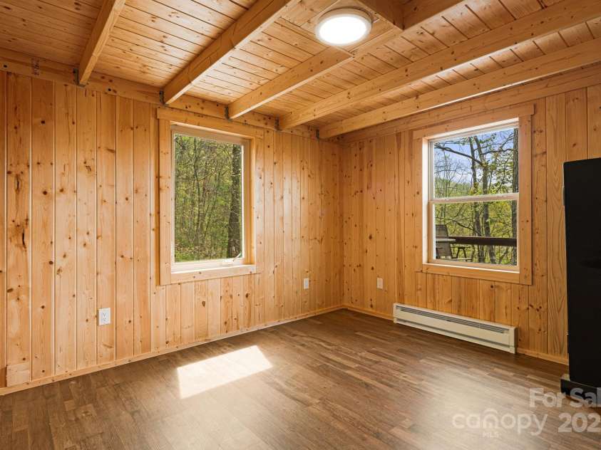 120 Wilderness Drive, Weaverville, NC 28787.  MLS# CAR4268806, YatesRealty ID 20849. Exposed Beams in Guest Bedroom