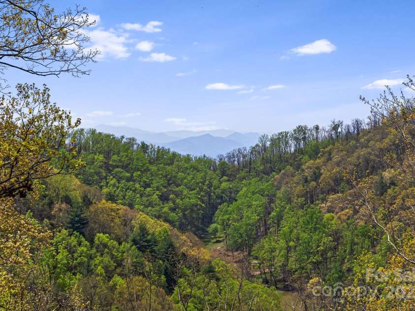 120 Wilderness Drive, Weaverville, NC 28787.  MLS# CAR4268806, YatesRealty ID 20849. Private Wilderness Getaway