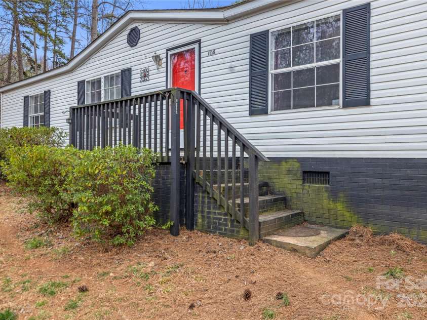 114 Catawba Woods Court, Belmont, NC 28012.  MLS# CAR4210954, YatesRealty ID 2085. Did you know a red door means hospitality?
