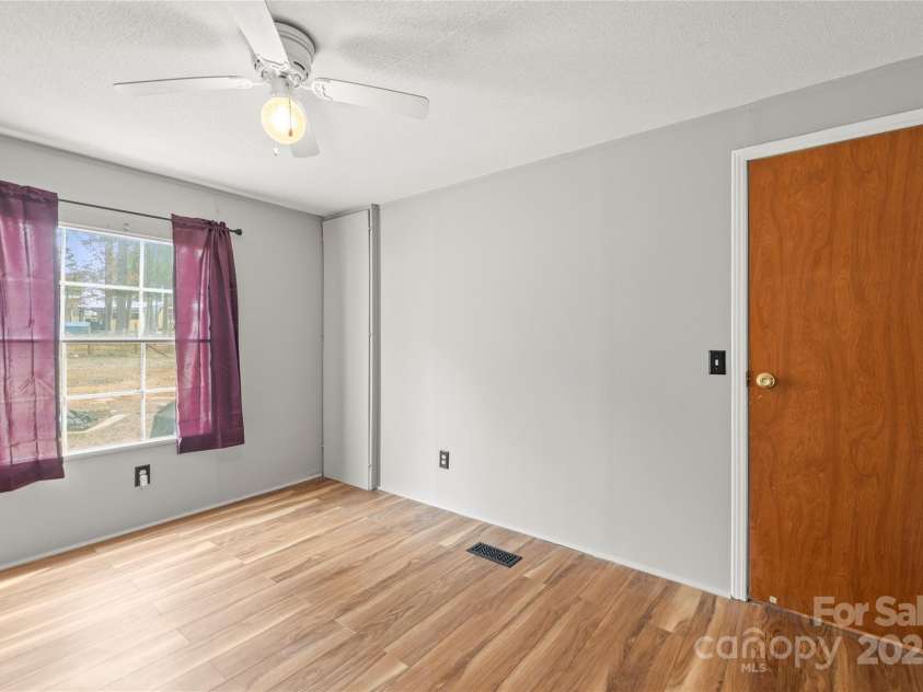 114 Catawba Woods Court, Belmont, NC 28012.  MLS# CAR4210954, YatesRealty ID 2085. Secondary bedroom w/new LVP flooring