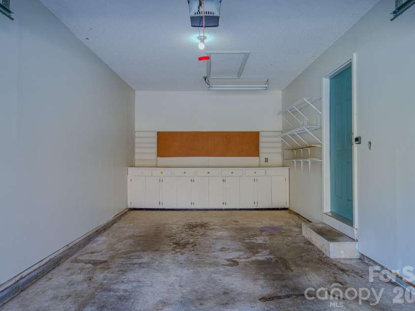 4 Hedgerose Court, Asheville, NC 28805.  MLS# CAR4356558, YatesRealty ID 20859. Storage is built in