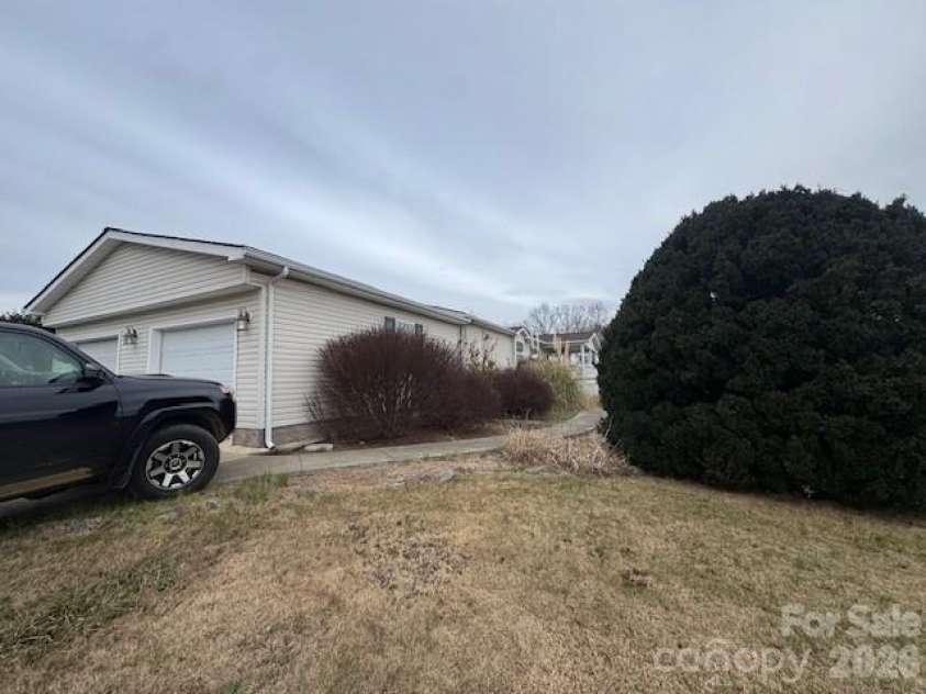 4 English Oaks Drive, Candler, NC 28715.  MLS# CAR4334695, YatesRealty ID 2086. Front