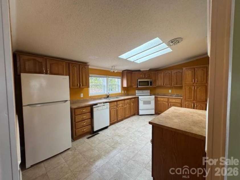 4 English Oaks Drive, Candler, NC 28715.  MLS# CAR4334695, YatesRealty ID 2086. Kitchen - Dishwasher to be replaced 01/14/2026