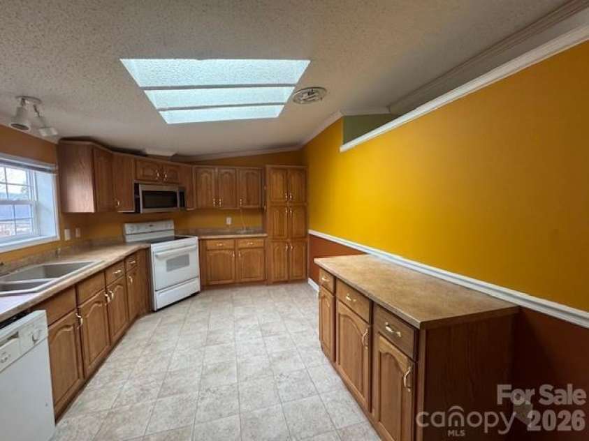 4 English Oaks Drive, Candler, NC 28715.  MLS# CAR4334695, YatesRealty ID 2086. Kitchen view 2