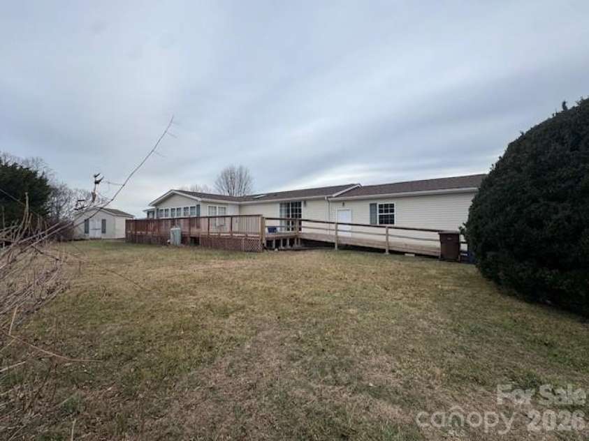 4 English Oaks Drive, Candler, NC 28715.  MLS# CAR4334695, YatesRealty ID 2086. Rear